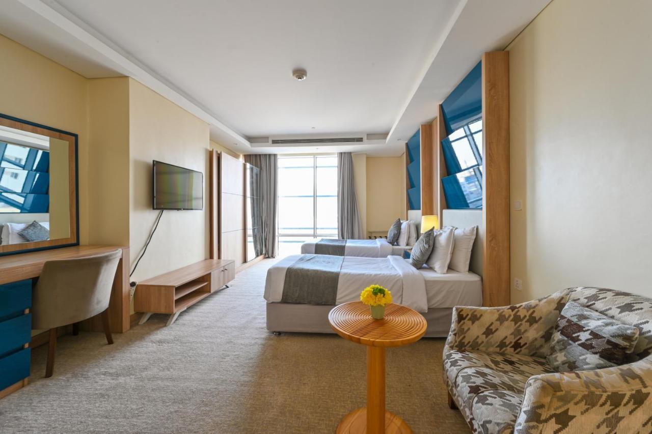 Al Mansour Suites Hotel Doha Exterior foto