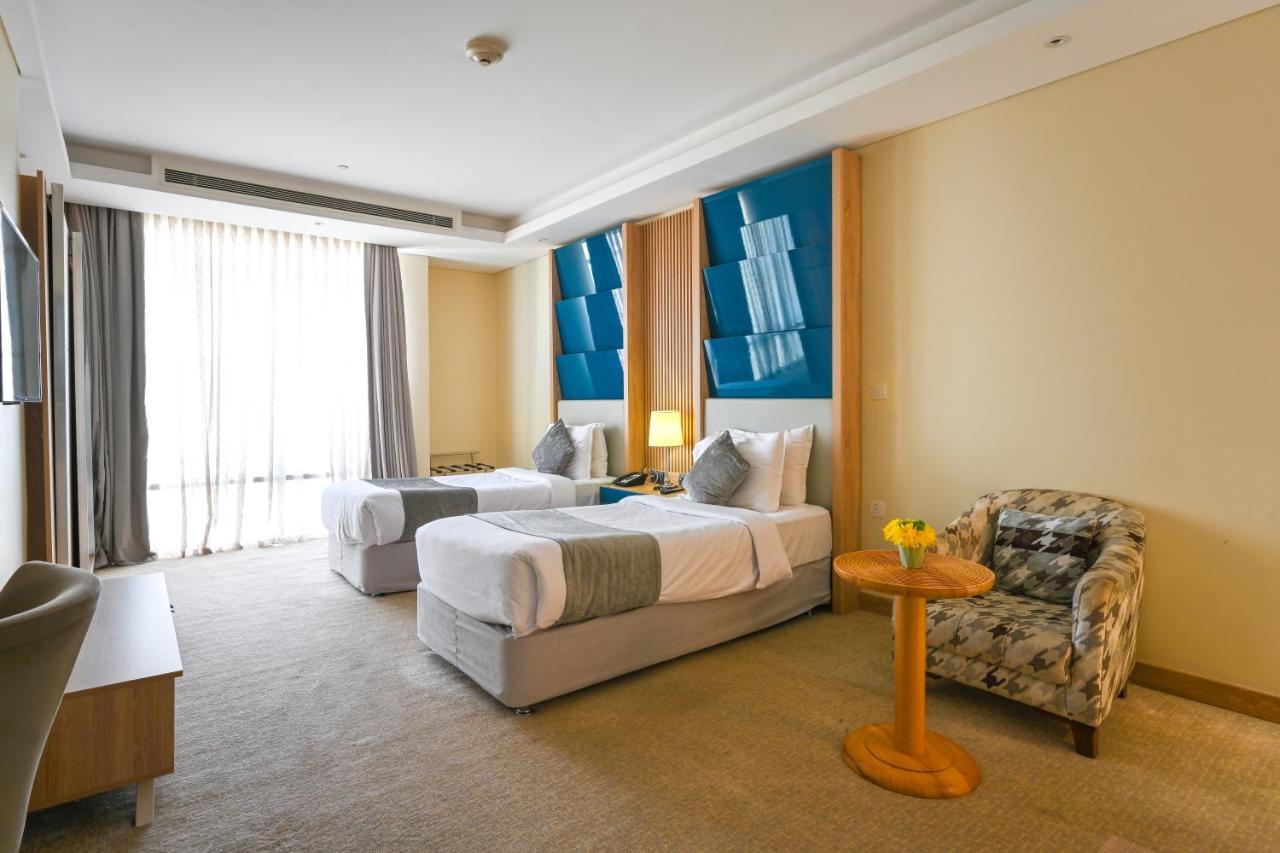 Al Mansour Suites Hotel Doha Exterior foto